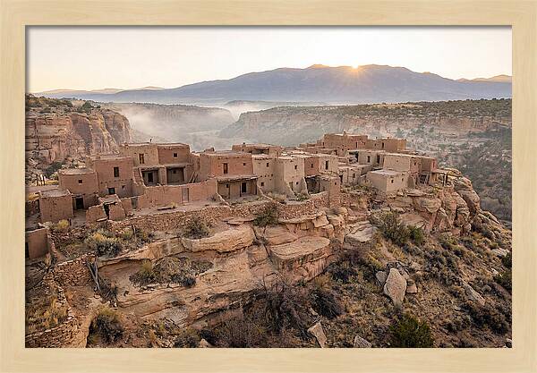 Adobe Pueblo Buildings At Sunset