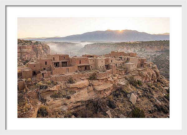 Adobe Pueblo Buildings At Sunset