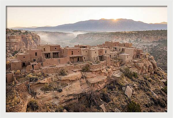 Adobe Pueblo Buildings At Sunset