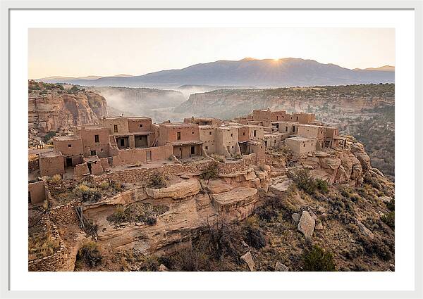 Adobe Pueblo Buildings At Sunset