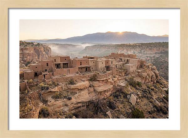 Adobe Pueblo Buildings At Sunset