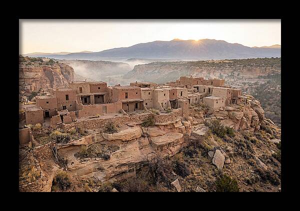 Adobe Pueblo Buildings At Sunset