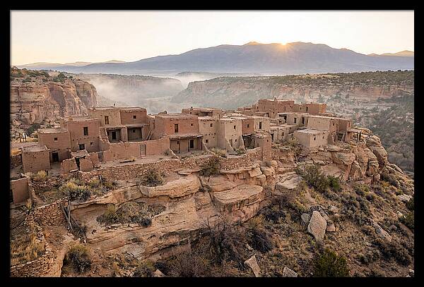 Adobe Pueblo Buildings At Sunset