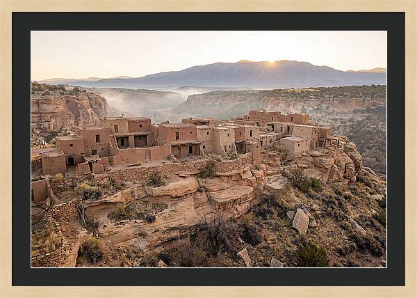 Adobe Pueblo Buildings At Sunset