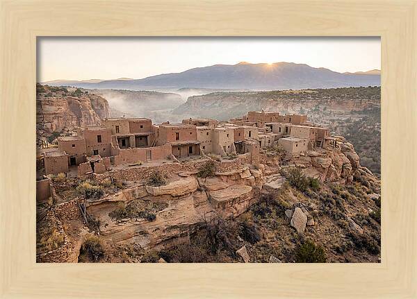 Adobe Pueblo Buildings At Sunset