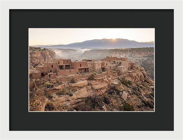 Adobe Pueblo Buildings At Sunset