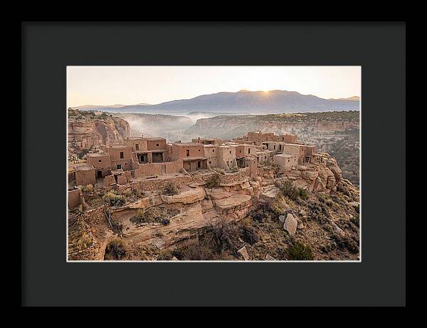 Adobe Pueblo Buildings At Sunset