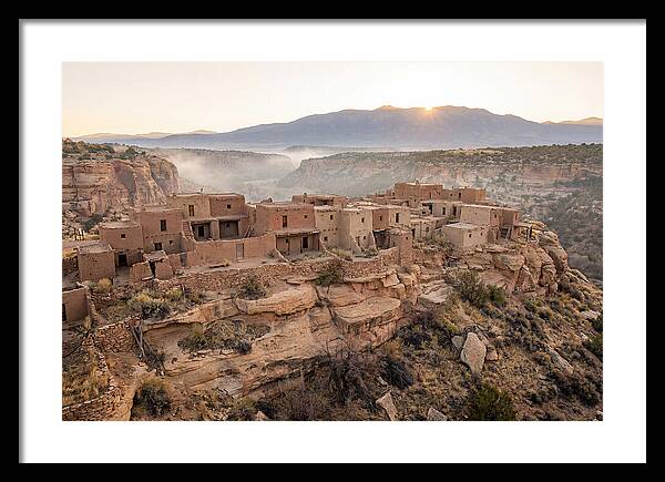 Adobe Pueblo Buildings At Sunset