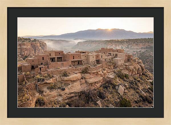 Adobe Pueblo Buildings At Sunset