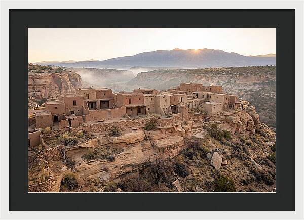 Adobe Pueblo Buildings At Sunset