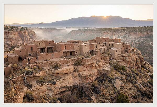 Adobe Pueblo Buildings At Sunset