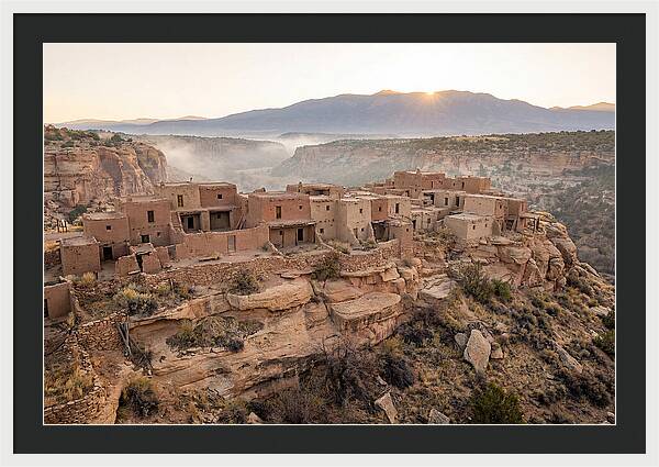 Adobe Pueblo Buildings At Sunset