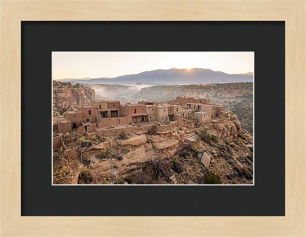 Adobe Pueblo Buildings At Sunset