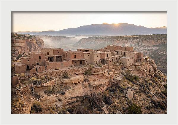 Adobe Pueblo Buildings At Sunset