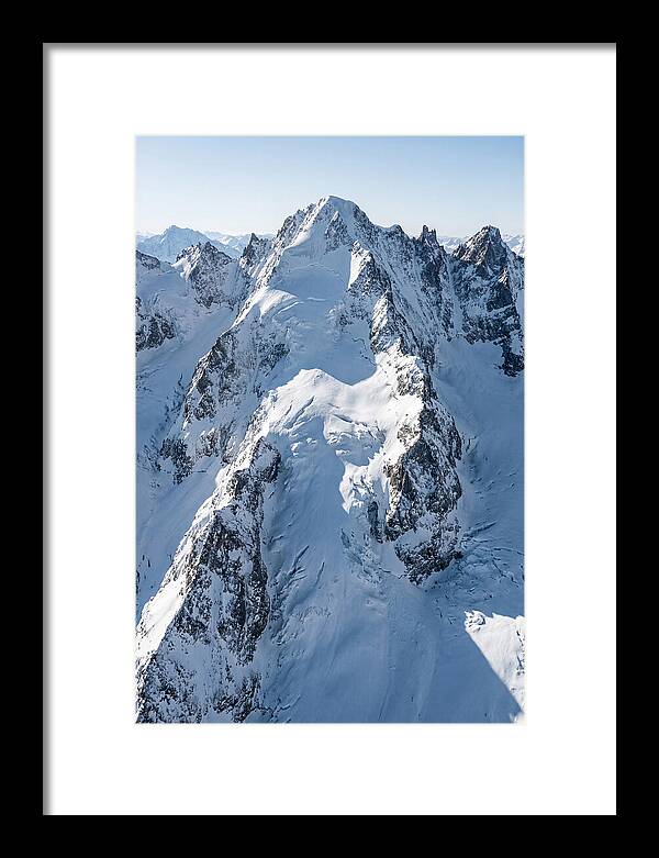Aerial View Of Snowcapped Peaks