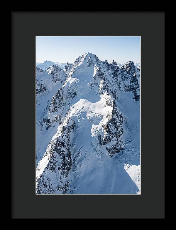 Aerial View Of Snowcapped Peaks
