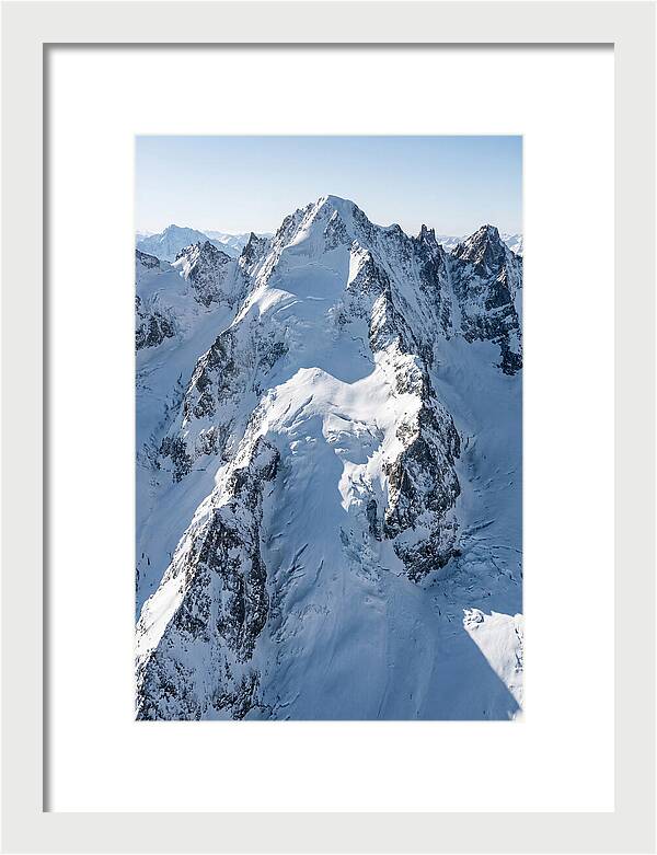 Aerial View Of Snowcapped Peaks