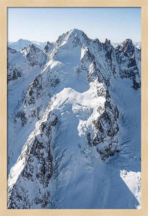 Aerial View Of Snowcapped Peaks