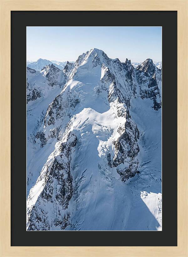 Aerial View Of Snowcapped Peaks