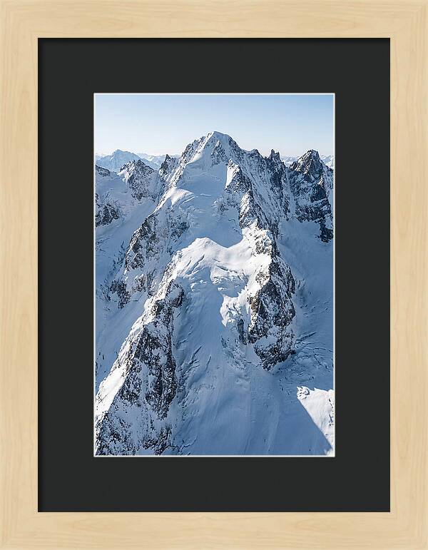 Aerial View Of Snowcapped Peaks