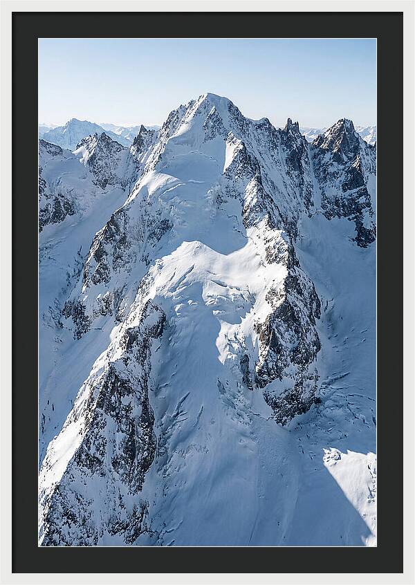 Aerial View Of Snowcapped Peaks