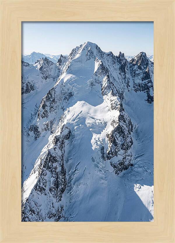 Aerial View Of Snowcapped Peaks