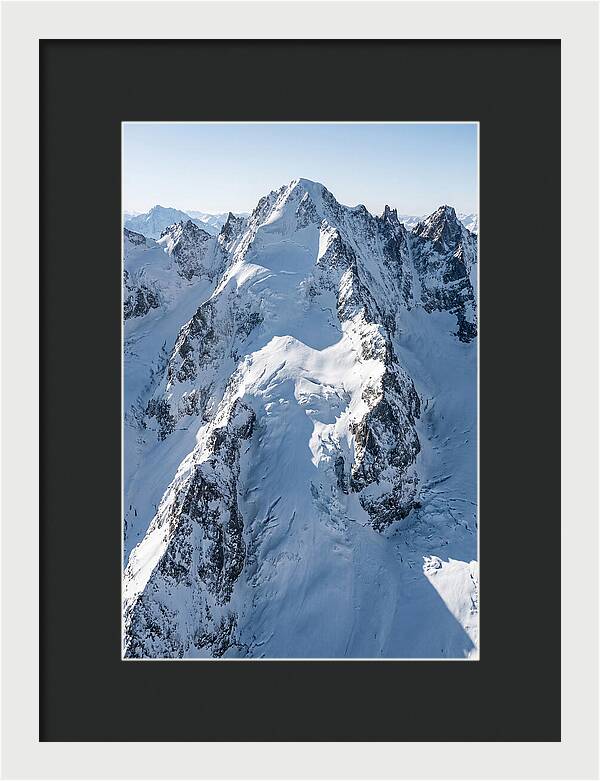 Aerial View Of Snowcapped Peaks