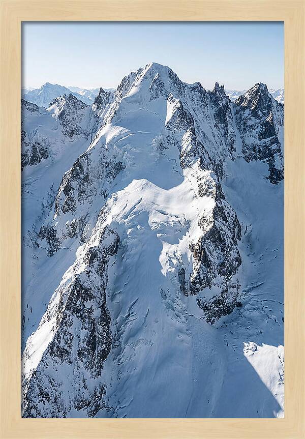 Aerial View Of Snowcapped Peaks