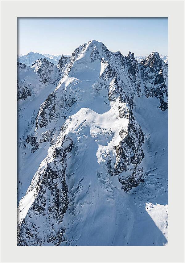 Aerial View Of Snowcapped Peaks