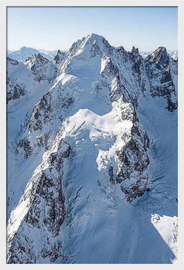 Aerial View Of Snowcapped Peaks
