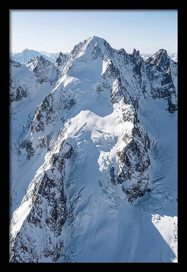 Aerial View Of Snowcapped Peaks