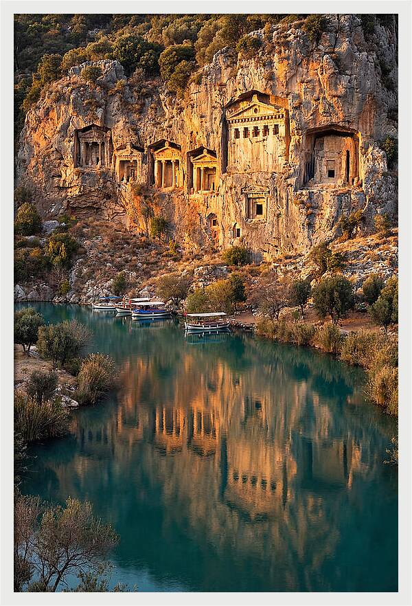 Ancient Lycian Rock Tombs At Sunset