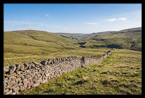 Ancient Stone Wall Over Rolling Hills