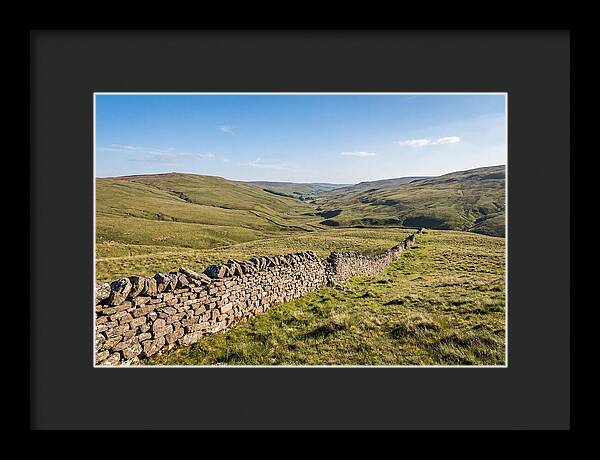 Ancient Stone Wall Over Rolling Hills