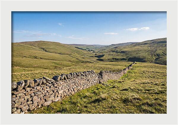 Ancient Stone Wall Over Rolling Hills