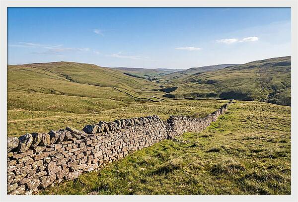 Ancient Stone Wall Over Rolling Hills