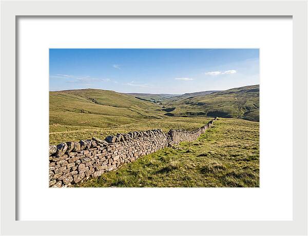 Ancient Stone Wall Over Rolling Hills