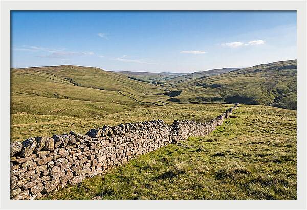 Ancient Stone Wall Over Rolling Hills