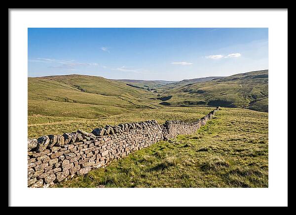 Ancient Stone Wall Over Rolling Hills