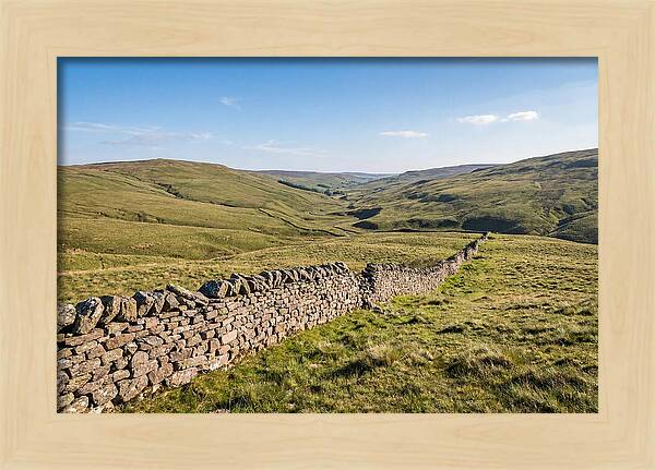 Ancient Stone Wall Over Rolling Hills