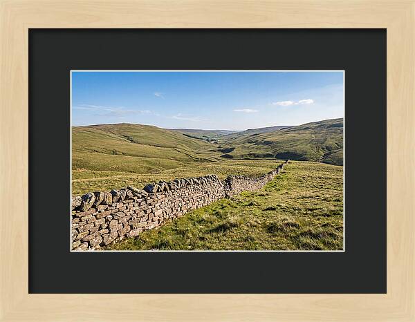 Ancient Stone Wall Over Rolling Hills