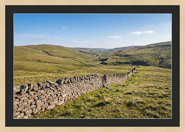 Ancient Stone Wall Over Rolling Hills