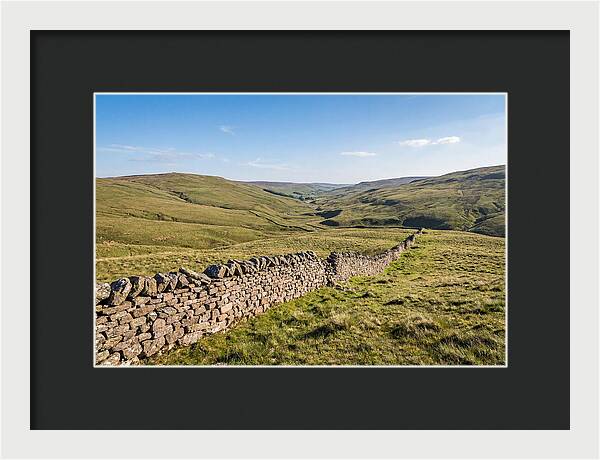 Ancient Stone Wall Over Rolling Hills