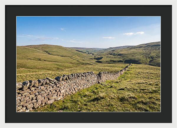 Ancient Stone Wall Over Rolling Hills