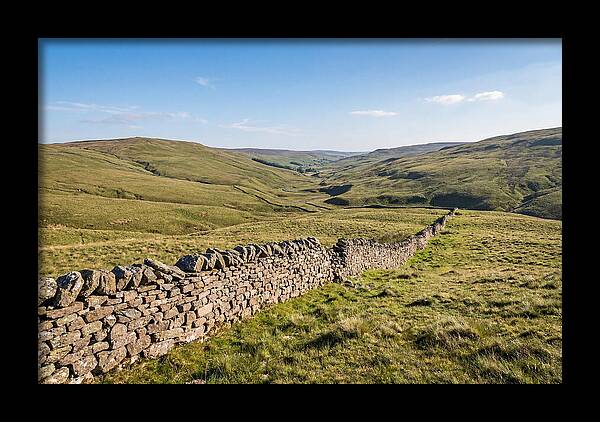 Ancient Stone Wall Over Rolling Hills