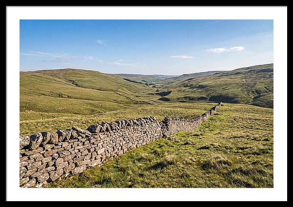 Ancient Stone Wall Over Rolling Hills