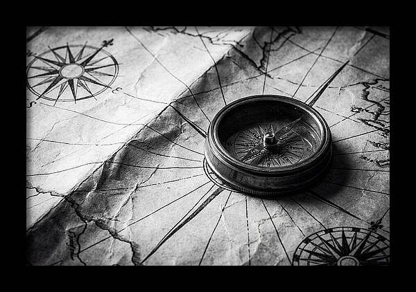 Antique Compass On Vintage Map