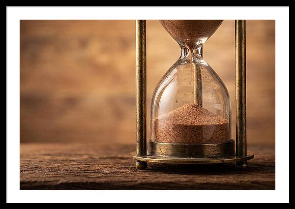 Antique Hourglass On Wood Surface