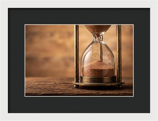 Antique Hourglass On Wood Surface