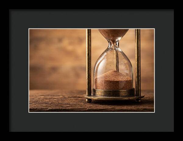 Antique Hourglass On Wood Surface